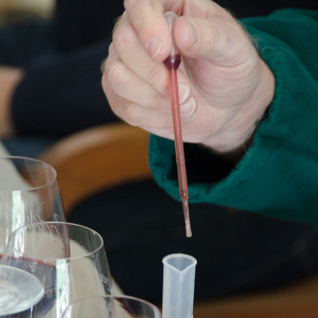 Measuring the wine carefully